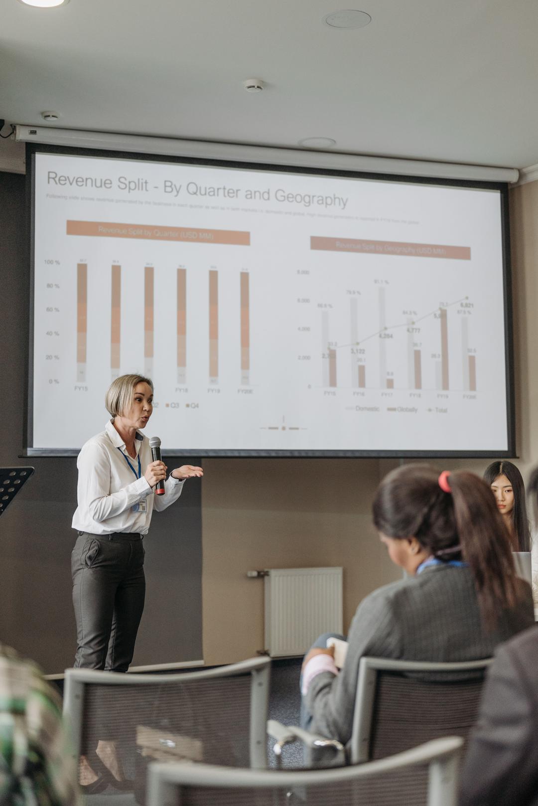 Illustration of a professor presenting in a lecture hall, with students watching on various devices